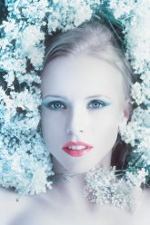 girl-with-flowers-1374221_1920